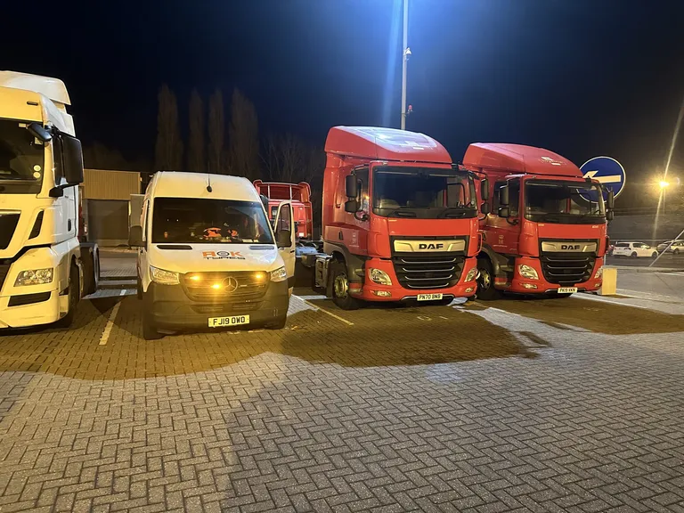 AOK van helping a line up of trucks