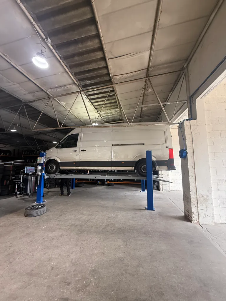 Van on a garage ramp