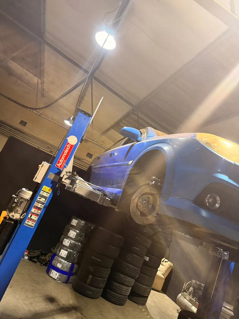 Volvo on a garage ramp